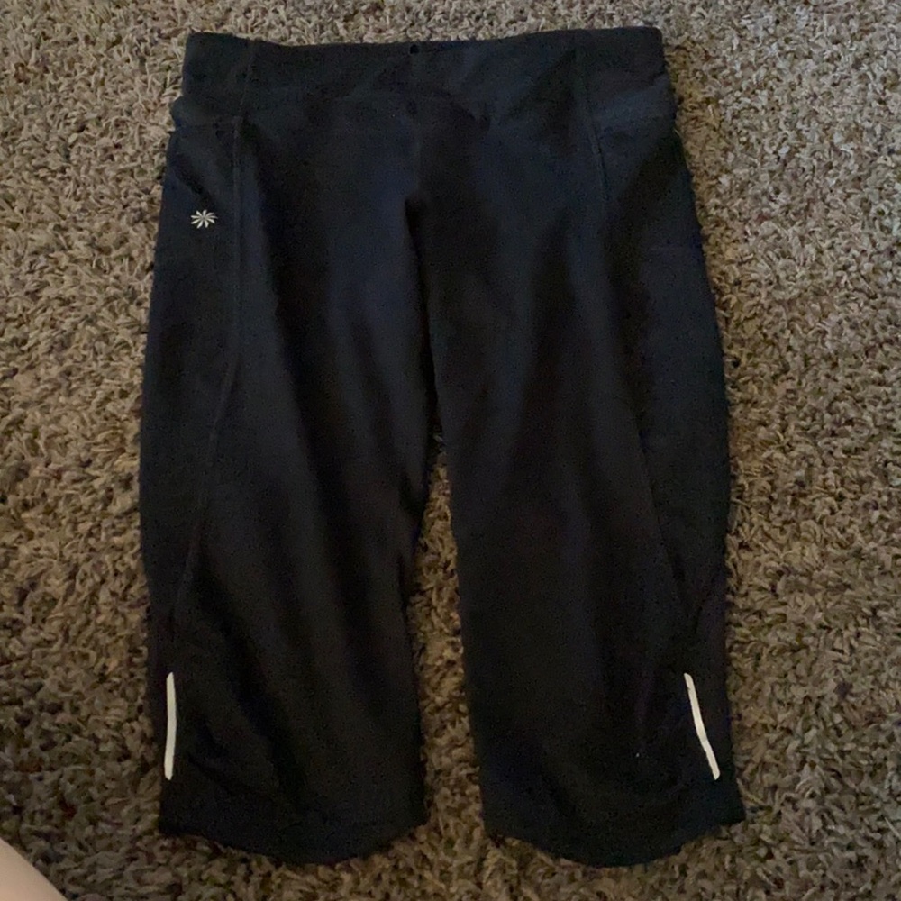 Ladies running capris, hit right on knee.